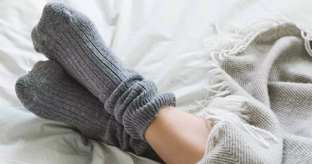 dormir com meias